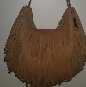 Carlos Santana fringe like hobo inspired bag